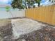 Open backyard area with a concrete slab for a shed or recreational space at 1902 24Th W Ave, Bradenton, FL 34205