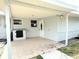 Charming covered front patio with tiled flooring and a freshly painted exterior at 1902 24Th W Ave, Bradenton, FL 34205