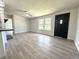 Inviting living room with large windows, new floors, and an open layout perfect for entertaining guests or relaxing at home at 1902 24Th W Ave, Bradenton, FL 34205