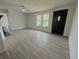 Bright living room with a large window and modern flooring at 1902 24Th W Ave, Bradenton, FL 34205