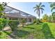 Expansive backyard with a screened enclosure, offering a perfect blend of indoor-outdoor living at 2809 112Th E Ter, Parrish, FL 34219