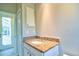 Well-lit bathroom featuring a granite countertop vanity with extra storage space at 2809 112Th E Ter, Parrish, FL 34219