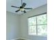 Bedroom featuring modern ceiling fan, neutral paint, a large window for natural light, and neutral walls at 2809 112Th E Ter, Parrish, FL 34219