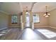 Elegant entryway showcases a decorative glass door, chandelier lighting, and wood flooring at 2809 112Th E Ter, Parrish, FL 34219