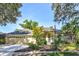 Lovely single-story home featuring a three-car garage, well-manicured landscaping, and an inviting facade at 2809 112Th E Ter, Parrish, FL 34219