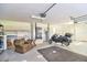 Large garage with storage shelves, water heater and room for vehicle at 2809 112Th E Ter, Parrish, FL 34219