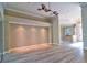 Open concept living room featuring modern flooring, recessed lights, and adjacent dining and entryway at 2809 112Th E Ter, Parrish, FL 34219