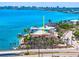 Breathtaking waterfront property featuring lush landscaping, a private dock, and easy access to the bay and ocean at 290 N Washington Dr, Sarasota, FL 34236