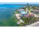 Beautiful waterfront home with a private dock, in-ground pool, and lush landscaping, offering serene waterfront living at 290 N Washington Dr, Sarasota, FL 34236