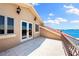 This balcony offers ample room for seating, and views of the serene waterway below at 290 N Washington Dr, Sarasota, FL 34236