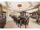 Formal dining area featuring an ornate chandelier, elegant decor, and open concept at 290 N Washington Dr, Sarasota, FL 34236
