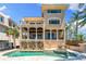 Stunning multi-story residence featuring a private pool, spa, and meticulous outdoor landscaping at 290 N Washington Dr, Sarasota, FL 34236