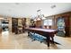 Spacious game room with a pool table, bar area, and decorative accents at 290 N Washington Dr, Sarasota, FL 34236