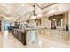 Gorgeous kitchen with island, custom cabinets, and stainless steel appliances at 290 N Washington Dr, Sarasota, FL 34236
