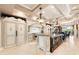 Spacious kitchen with custom island, granite countertops, and modern appliances at 290 N Washington Dr, Sarasota, FL 34236