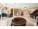 Spacious living room featuring ornate details, marble floors, and a grand piano at 290 N Washington Dr, Sarasota, FL 34236