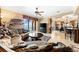 Cozy living room featuring an ornate couch, water views, and a ceiling fan at 290 N Washington Dr, Sarasota, FL 34236