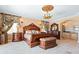 Lavish main bedroom features an ornate bed, custom lighting, decor, and detailed furnishings at 290 N Washington Dr, Sarasota, FL 34236
