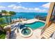 Backyard pool and jacuzzi with a view of the water at 290 N Washington Dr, Sarasota, FL 34236