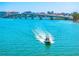 Picture of a beautiful waterway, bridge, and a boat approaching, capturing the essence of waterfront living at 290 N Washington Dr, Sarasota, FL 34236