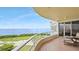 Enjoy the water view from the spacious covered balcony at 3060 Grand Bay Blvd # 182, Longboat Key, FL 34228