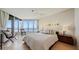Relaxing bedroom with balcony access and stunning waterfront views at 3060 Grand Bay Blvd # 182, Longboat Key, FL 34228