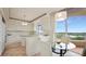 Bright kitchen featuring a breakfast nook with beautiful views at 3060 Grand Bay Blvd # 182, Longboat Key, FL 34228
