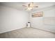 Bedroom features a ceiling fan, carpeted floor, and natural light at 3108 Rock Sound St, Bradenton, FL 34208