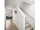 Hallway with stairs with view of the living room at 3108 Rock Sound St, Bradenton, FL 34208