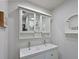 Bright bathroom with a double sink vanity, stylish mirror, and modern fixtures at 3212 Avenue A W, Bradenton, FL 34205