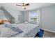Comfortable bedroom with a lake view, ceiling fan, and lots of natural light at 4708 26Th W Ave, Bradenton, FL 34209