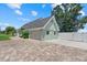 Detached garage with a paved driveway, providing ample parking and storage space in a well maintained home at 4708 26Th W Ave, Bradenton, FL 34209