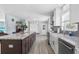 Kitchen with a farmhouse sink, stainless appliances, and a center island at 4708 26Th W Ave, Bradenton, FL 34209