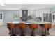 Spacious kitchen featuring a large island with seating, sleek countertops, and modern appliances at 4708 26Th W Ave, Bradenton, FL 34209