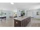 Spacious kitchen island offering views to the living room and lake at 4708 26Th W Ave, Bradenton, FL 34209