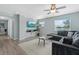 Bright living room with water view, ceiling fan, and comfortable seating at 4708 26Th W Ave, Bradenton, FL 34209