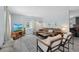 Cozy living room with tile floors, neutral walls, and comfortable seating at 4708 26Th W Ave, Bradenton, FL 34209