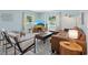 Bright living room featuring modern furniture, tile floors, and natural lighting at 4708 26Th W Ave, Bradenton, FL 34209