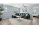 Open-concept living room filled with natural light featuring a comfortable seating area at 4708 26Th W Ave, Bradenton, FL 34209