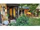 Front of the house, showcasing the address, stone facade and lush landscaping at 4873 Huntleigh Dr, Sarasota, FL 34233