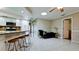 Spacious kitchen area open to the Gathering room, complete with a breakfast bar and ample seating at 4873 Huntleigh Dr, Sarasota, FL 34233