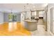 Modern kitchen featuring stainless steel appliances and a seamless flow to the living area at 5168 Northridge Rd # 106, Sarasota, FL 34238