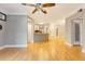 Open layout featuring hardwood floors, view of the kitchen, and recessed lighting at 5168 Northridge Rd # 106, Sarasota, FL 34238
