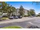Exterior shot of complex with well-maintained parking area at 5168 Northridge Rd # 106, Sarasota, FL 34238