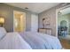 Comfortable bedroom with a closet, dresser, and access to bathroom and dining area at 525 N Orange Ave # 202, Sarasota, FL 34236