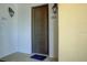 Hallway with doors 202 and 203, featuring a modern design and neutral color palette at 525 N Orange Ave # 202, Sarasota, FL 34236