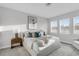 Well-lit bedroom with neutral decor, stylish furnishings, and an abundance of natural light at 5770 Long Shore Loop, Sarasota, FL 34238