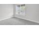 Bright bedroom with carpeted flooring, and lots of natural light at 5770 Long Shore Loop, Sarasota, FL 34238