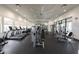 Modern gym with treadmills, weight machines, and large mirrors for a complete workout experience at 5770 Long Shore Loop, Sarasota, FL 34238