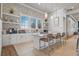 Modern kitchenette featuring sleek countertops, ample storage, and stainless steel appliances at 5770 Long Shore Loop, Sarasota, FL 34238